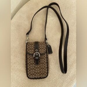 Coach phone carry bag.